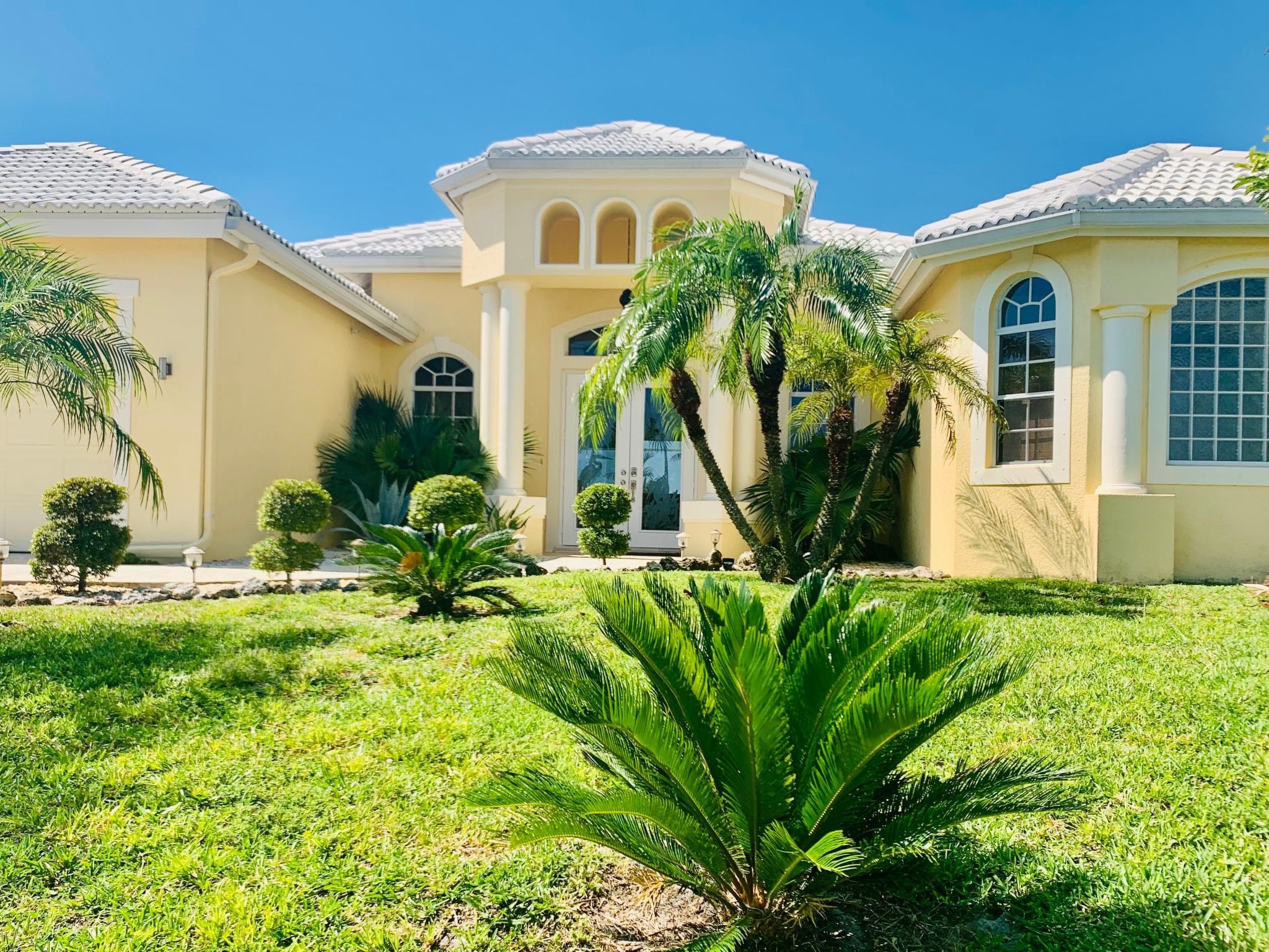Waterfront Luxury with Screened Infinity-Style Pool & Southern Exposure